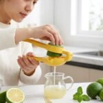 Presse-agrumes rotatif manuel